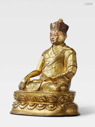 A GILT COPPER ALLOY FIGURE OF A SHAMARPA, POSSIBLY THE SIXTH SHAMARPA, MIPAM CHOKYI WANGCHUK TIBET, CIRCA 16TH CENTURY