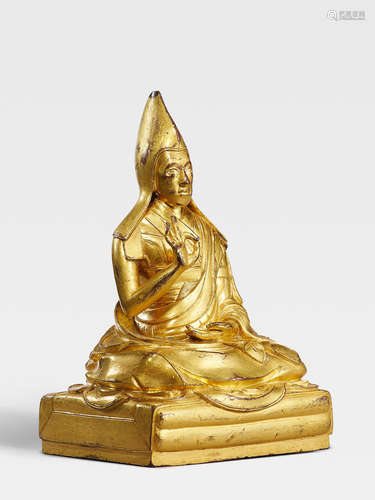 A GILT COPPER ALLOY FIGURE OF THE SECOND PANCHEN LAMA, LOBZANG YESHE QING DYNASTY, 17TH/18TH CENTURY