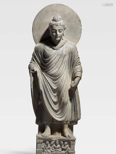 A SCHIST FIGURE OF BUDDHA ANCIENT REGION OF GANDHARA, CIRCA 3RD CENTURY