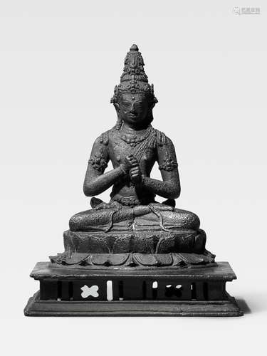 A COPPER ALLOY FIGURE OF VAIROCANA JAVA, INDONESIA, CIRCA 10TH CENTURY