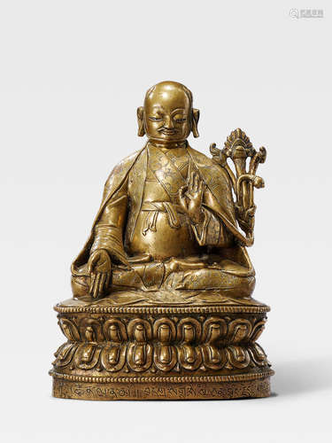 A SILVER INLAID BRASS FIGURE OF THE THIRD SAKYA THRONE HOLDER SACHEN KUNGA NYINGPO TIBET, 16TH CENTURY