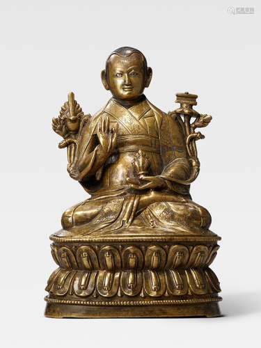 A SILVER AND COPPER INLAID BRASS FIGURE OF LOWO KENCHEN SONAM LHUNDRUP TIBET, 16TH CENTURY