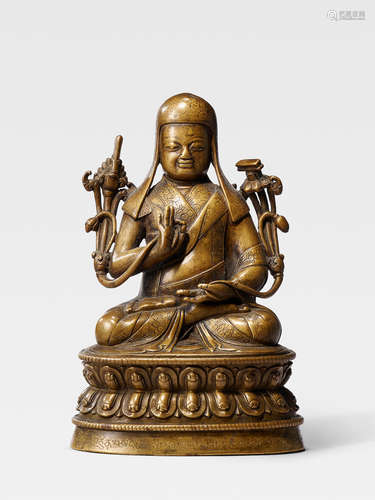 A BRASS FIGURE OF LOWO KENCHEN SONAM LHUNDRUP TIBET, 16TH CENTURY