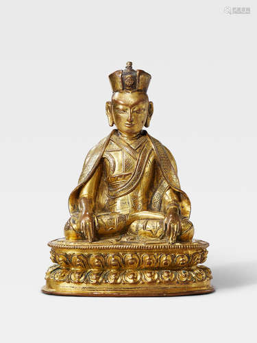 A GILT COPPER ALLOY FIGURE OF THE THIRD KARMAPA, RANGJUNG DORJE TIBET, 16TH CENTURY