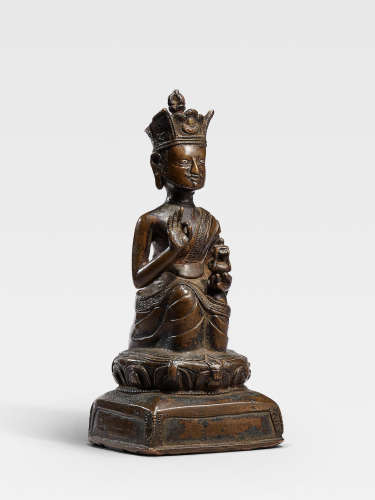 A SILVER AND COPPER INLAID COPPER ALLOY FIGURE OF PHARGYONG TSULTRIM GYELTSEN TIBET, 16TH CENTURY