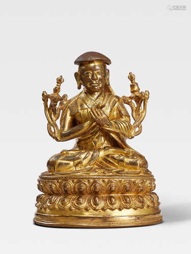 A GILT COPPER ALLOY FIGURE OF PANCHEN RINCHEN KYOB TIBET, 16TH CENTURY