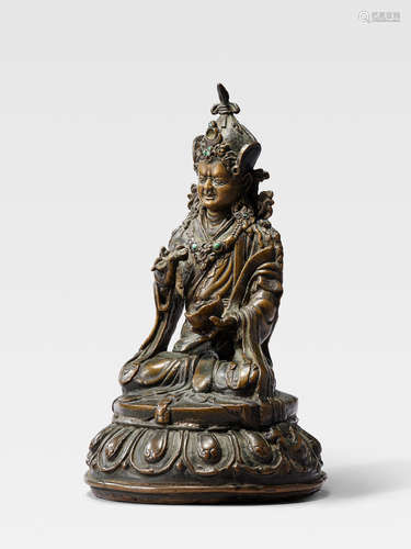 A COPPER ALLOY FIGURE OF PADMASAMBHAVA TIBET, 16TH CENTURY