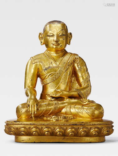 A GILT COPPER ALLOY FIGURE OF THE SIXTH ABBOT OF DRIGUNG MONASTERY, TOKKHAWA RINCHEN SENGGE CENTRAL TIBET, DENSATIL, 14TH CENTURY