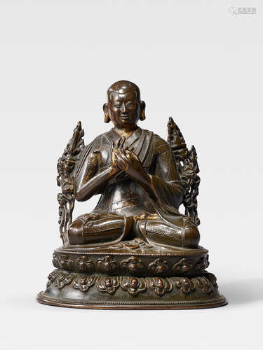 A COPPER ALLOY FIGURE OF A HIERARCH TIBET, 17TH CENTURY