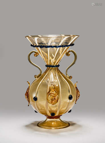 Salviati & C. (founded 1877) Vase circa 1890 blown glass with applied prunts and handles, internally decorated with gold powders height 9 1/2in (24cm); diameter 6in (15cm)