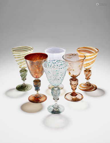 Salviati & C. (founded 1877) Set of Six Lion's-Head Mask Wine Cups circa 1890 including two examples of filigree design, one aventurine example and two applied each height 7 1/4in (18.5cm); diameter 4in (10cm)