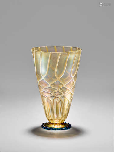 BENVENUTO (1853-1942) & GIUSEPPE BAROVIER (1855-1931); ATTRIBUTED TO Beaker with White Canes circa 1890 for Salviati & C., blown glass with applied white canes and with iridized surface height 6 1/2in (16cm); diameter 4in (10cm)