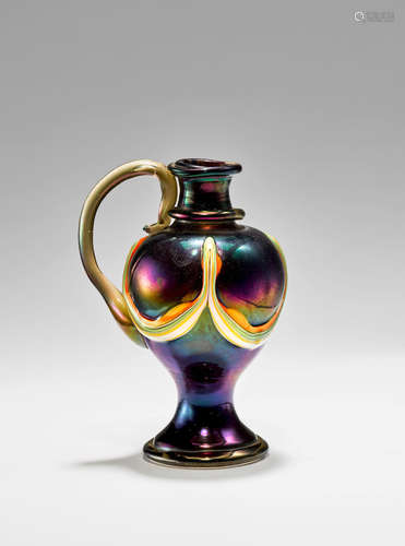 Venetian Vase circa 1890 glass with handle and applied decoration and with iridized surface height 3 1/2in (9cm); width 2 3/4in (7cm)