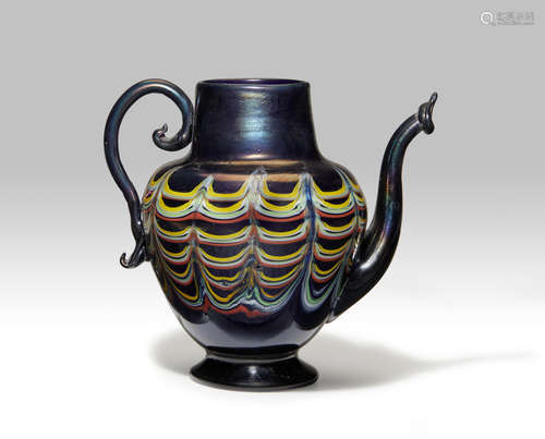 Fratelli Toso (1902-1980) Spouted Fenicio Vase circa 1900 blown and applied fenicio glass with an iridescent surface height 5in (12.5cm); width 5 1/2in (14cm)