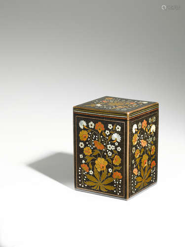 Aesthetic Movement Tea Caddy circa 1875 inlaid ebony with mother of pearl, silver, copper and brass wire, and various exotic woods to form scrolling branches, tendrils and flowerheads, the hinged lid opening to a glass-lined interior with chrome cover height 6in (15.2cm); width 4 1/2in (11.4cm); depth 4 1/2in (11.4cm)