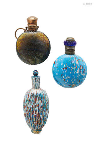 Venetian Three Scent Bottles circa 1870 blown glass, internally decorated with gold powders, gilt metal lengths 4 1/2in (11cm); 3 1/2in (9cm); 3in (7.5cm)