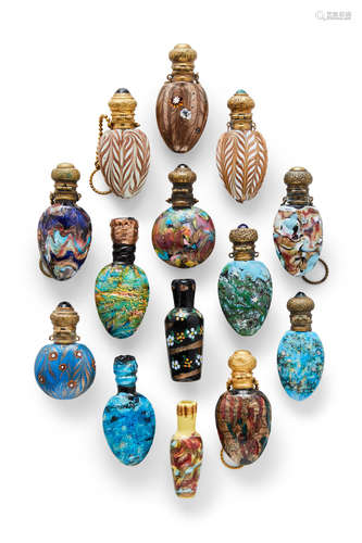 Venetian Group of Fourteen Murrine Scent Bottle Second Half of the 19th Century including one example with portrait murrine, one with murrine of the Bridge of Sighs, one with starfish murrines and one with star murrines, others in aventurine and smeltz glass largest length 3in (7cm); width 1 1/4in (3.5cm); smallest length 2 1/2in (6.5cm); width 1in (2.5cm)