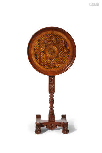 Louis C. Tiffany (1848-1930) for Associated Artists Side Table circa 1885 carved teak, parquetry, incorporating Lockwood de Forest teak elements height 30 1/2in (77.5cm); diameter 17 3/4in(45cm)