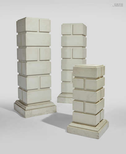 American Modern Pair of Rusticated Pedestals 20th Century together with a smaller modern white-painted rusticated square pedestal; painted wood height 65 1/4in (165.5cm); width 23in (59cm); depth 23in (59cm)