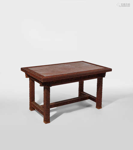 Lockwood de Forest (1850-1932) Library Table circa 1890 teak, carved by the Ahmedabad Wood Carving Company, Ahmedabad, India, possibly assembled in New York height 29in (74cm); width 52in (132cm); depth 32in (81cm)