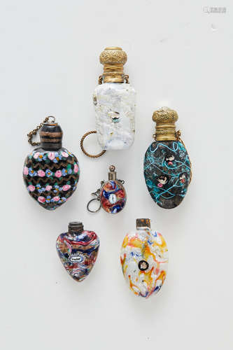 Giovanni Battista (1804-1873) and Giacomo Franchini (1827-1897) Murrine Scent Bottle circa 1870 fused glass, featuring the murrine of a gondola, white metal mounts; together with five other 19th century Venetian scent bottles, one featuring the murrine of the lion of Venice, two others with a gondola murrine, one with dove murrines length 1 1/4in (3.5cm); width 3/4in (2cm)