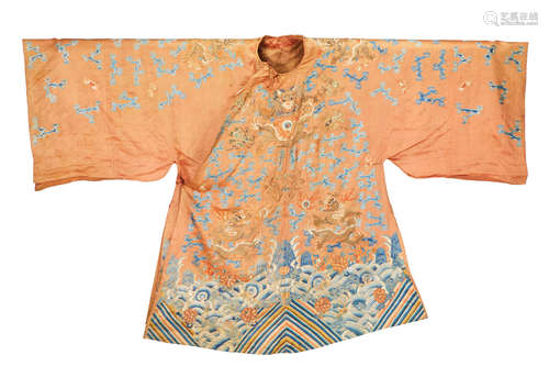 A CHINESE apricot Silk ground WOMAN'S WEDDING robe Mang'ao Early 19th Century