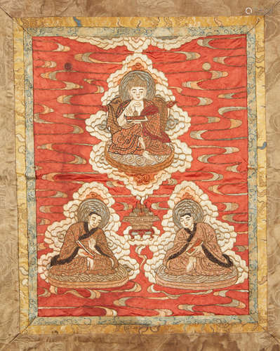 A CHINESE embroidered silk Buddhist hanging, Thangka 18th/19th Century