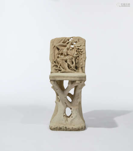 American Folk Art circa 1910 carved limestone, foliate formed with a nesting bird height 30in (76cm); width 12 1/2in (32cm); depth 15in (38cm)