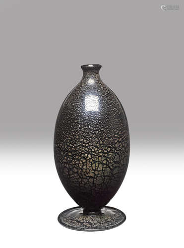 Carlo Scarpa (1906-1978) Vase circa 1929 for MVM Cappellin, model no. 5922, iridized opaque black glass with silver powders, acid stamp 'MVM Cappellin Murano' and remants of paper label 'CAPPEL...' height 7 1/4in (18.5cm); diameter 3 1/8in (8.2cm)