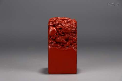 A Chinese Cinnabar Paperweight Of Dragon