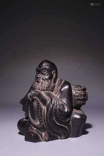 A Chinese Rosewood Bodhidharma Shaped Statue