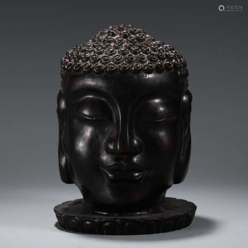 A Chinese Rosewood Buddha Head