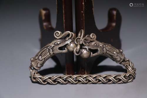 A Chinese Silver Bracelet Of Dargon Carving