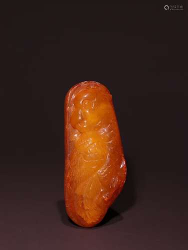 A Chinese Amber Pendant With Phoenix Carving