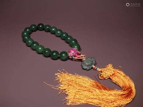 A Chinese Green Hetian Jade Bracelet