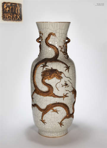 CHINESE VASE EMBOSSED WITH A DESIGN OF DRAGON.