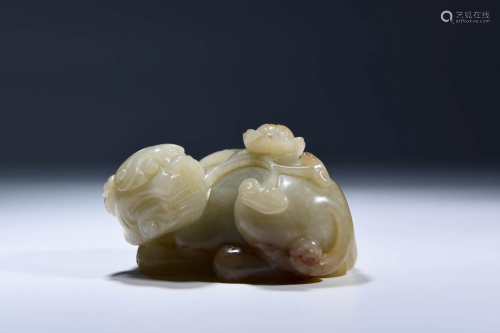 A CHINESE JADE CARVED BEAST ORNAMENT