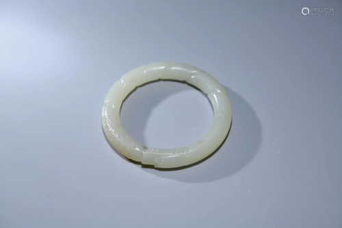 A CHINESE WHITE JADE BRACELET