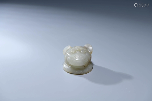 A CHINESE TIGER SHAPED WHITE JADE DECOR…