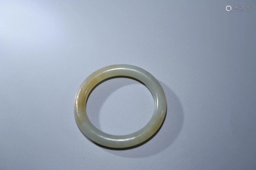 A CHINESE WHITE JADE BRACELET