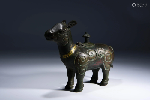 A CHINESE JADE CARVED RHINOCEROS ZUN …