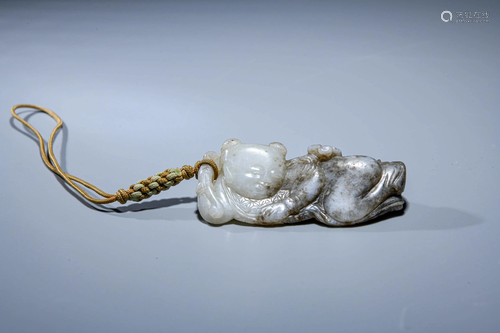 A CHINESE WHITE JADE CARVED BOY PENDANT