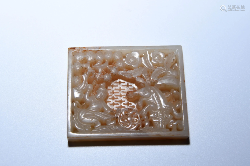 A CHINESE JADE CARVED ORNAMENT