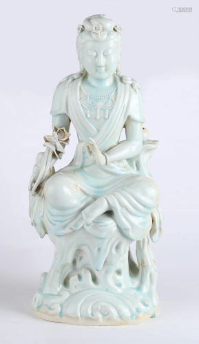A CHINESE BLUISH WHITE PORCELAIN GUANYIN…