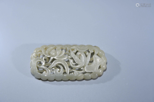 A CHINESE WHITE JADE PIERCING PENDANT