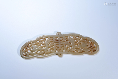 A CHINESE DRAGON CARVED JADE ORNAMENT