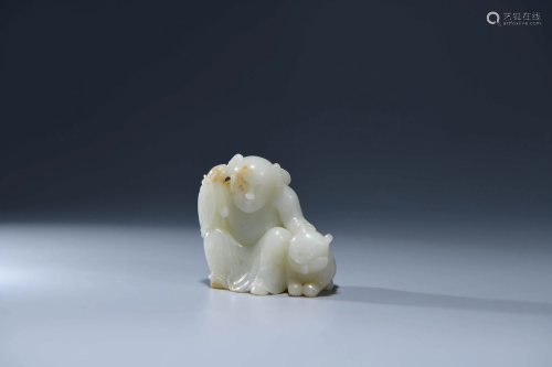 A CHINESE WHITE JADE CARVED ORNAMENT