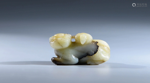 A CHINESE YELLOW JADE CARVED ORNAMENT