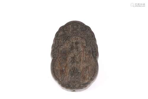 a chinese agalwood tablet