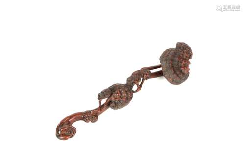 a chinese wood ruyi scepter